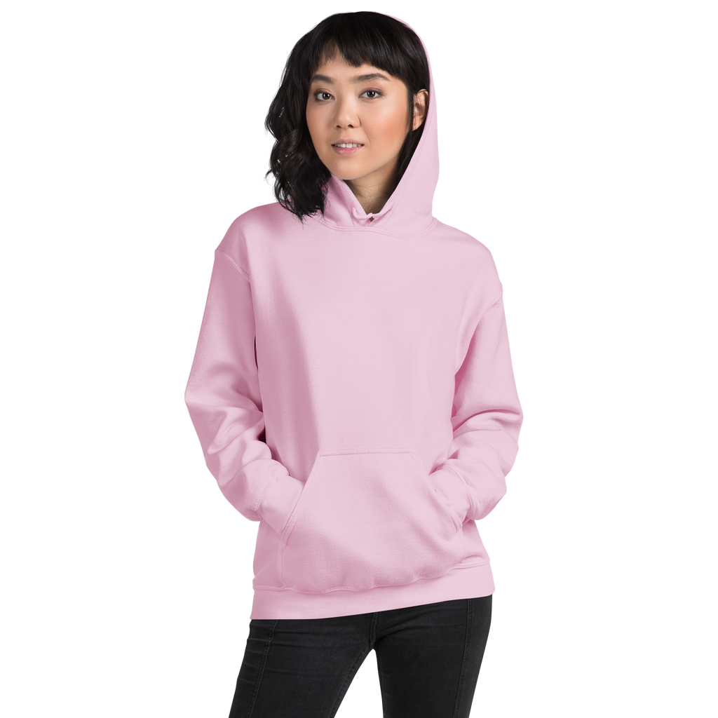 Woman wearing light pink SublimeElle Self-Love hoodie with quote ‘a vibe called self-love' in black, casual outdoor setting, front view.